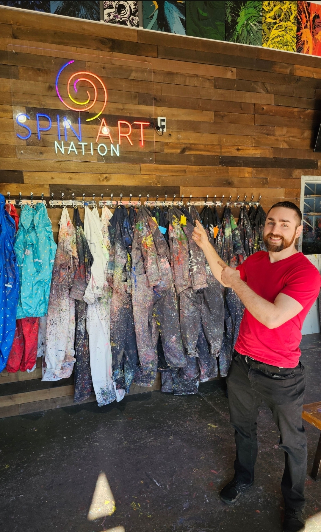 Spin Art Nation attraction pricing smocks display at the studio